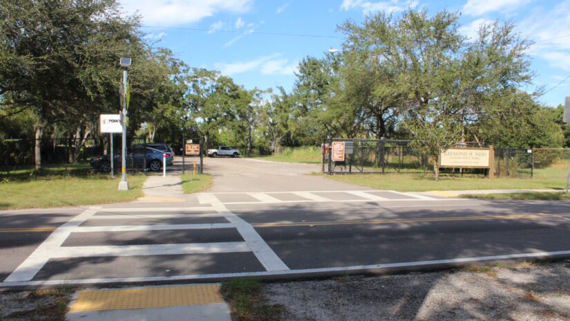 Raymond H. Neri Park entrance and sign